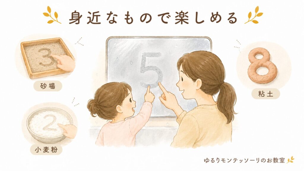 砂場や曇った鏡で数字を書いて遊ぶ親子